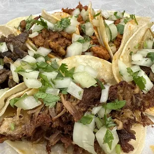 Beef, pollo, pastor, carnitas Tacos