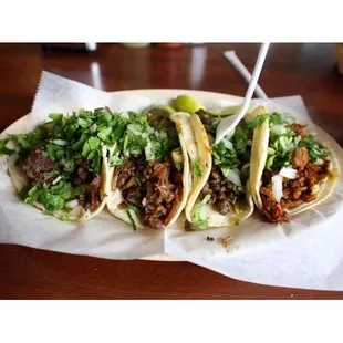 three tacos on a plate
