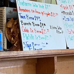 a variety of taqueria items on a shelf