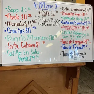 a menu on a white board