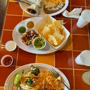 two plates of mexican food