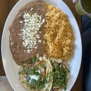 Carnitas street tacos, rice and beans