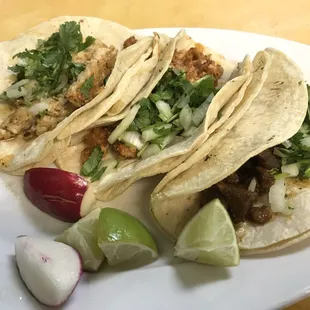 Pollo, Al Pastor, and Cabeza tacos ($2.35 each)