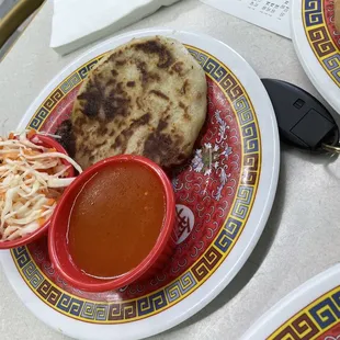 Pupusa con frijoles y queso (beans and cheese)