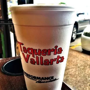 a drink in a plastic cup