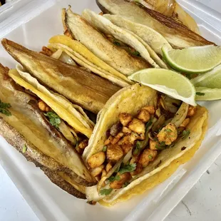 Chicken tacos with potatoes on top. Delicious!