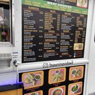 a menu on a food truck