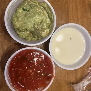 Guacamole, queso dip, and salsa