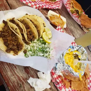 $8 for 5 tacos, a papa, soda, beans. YUMM