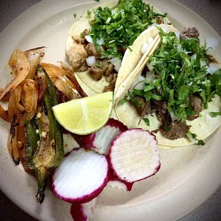 Pollo and lengua tacos