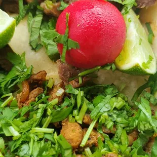 It may be rainin',  but there's a rainbow above you