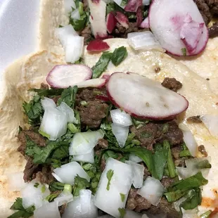 Beef tacos are my favorite here. And their red sauce is spicy  just how I like it.