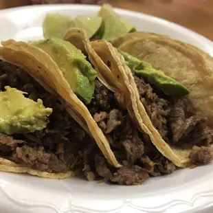 Tacos bistek. Onion/cilantro on side