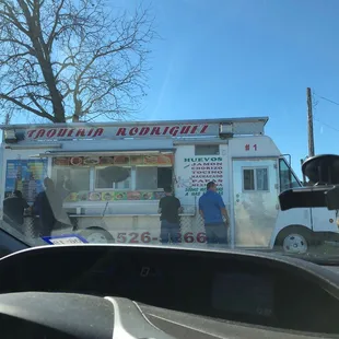 a taqueria on the side of the road