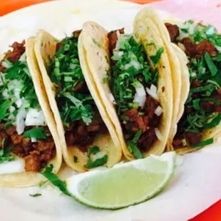 three tacos on a plate