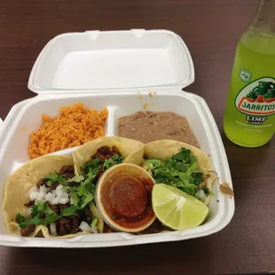 Three tacos and rice and beans (to go)