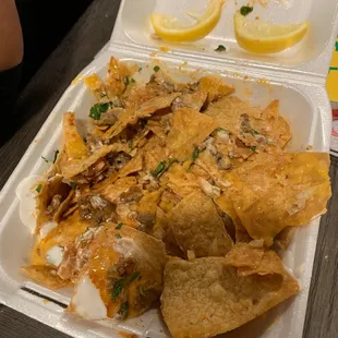 nachos in a styrofoam container