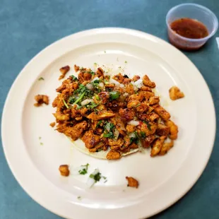 Delicious grilled chicken tacos piled with yummy chicken and spicy salsa! . My new go to taco spot.