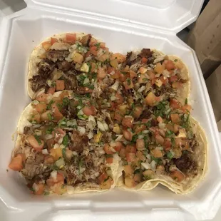 Shredded pork tacos.