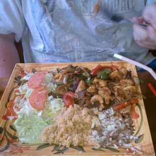 Chicken, beef and shrimp fajitas