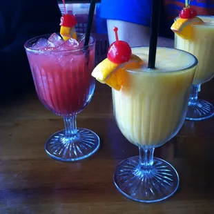 Margaritas; (right) strawberry on the rocks and (left) mango-peach "slushy" version