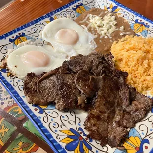 Steak and eggs meal