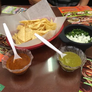 Chips, salsa (red &amp; green), onions, &amp; cilantro.
