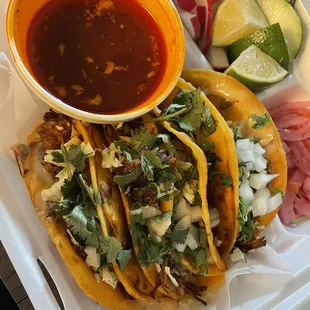 Birria tacos with consome