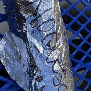a shoe wrapped in aluminum foil