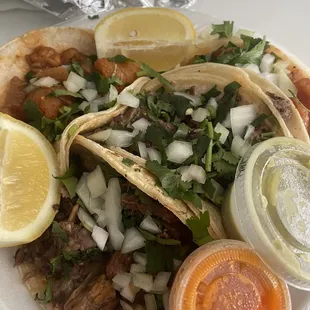 2 lengua and 2 chicharrones tacos