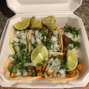 Chicken, beef, and pork tacos