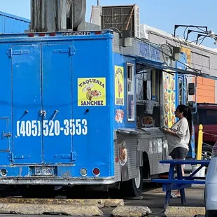 a food truck parked in a parking lot