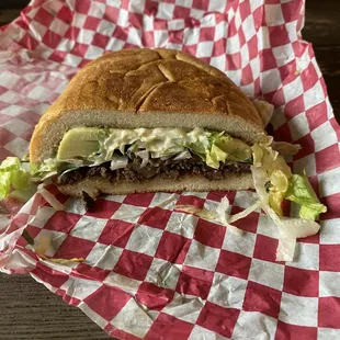 Torta de asada - comes with beans, carne asada, lettuce, avocado, mayo, cheese, cilantro, onion