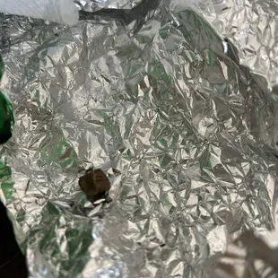 A ROCK IN MY PARTNER'S BURRITO!!