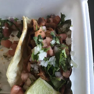 Al pastor taco with all the toppings.