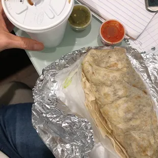 Burrito with salsas and coffee