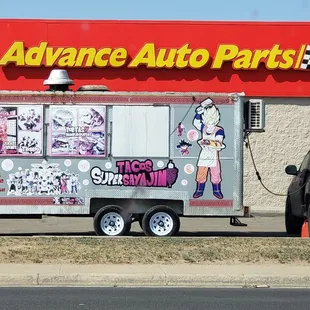a woman on the side of a truck