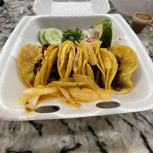 Mini tacos. The topping were all fresh and on point ate my gorditas too fast and they missed out on the photo shoot.