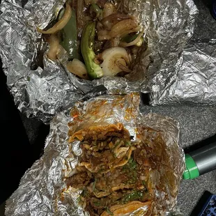 El Pastor Tacos and a side of grilled onions and jalapenos