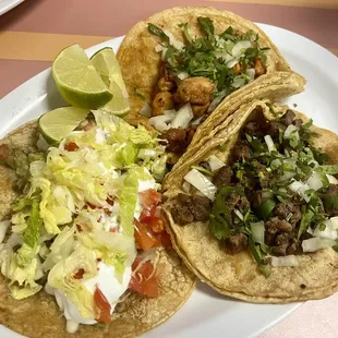 Steak, chicken, and vegetarian tacos.