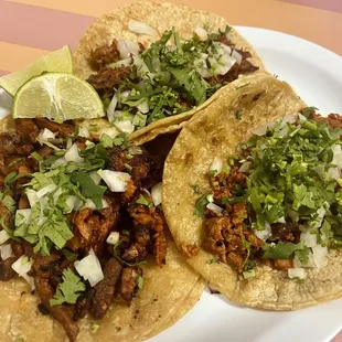 Al pastor, birria, and chorizo tacos.