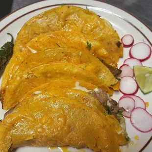 three tacos on a plate