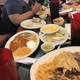 a table full of mexican food