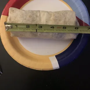 Here is the 12&quot; burrito I just received from Door Dash.  Bogus AF.  No beans!?   It sucks.