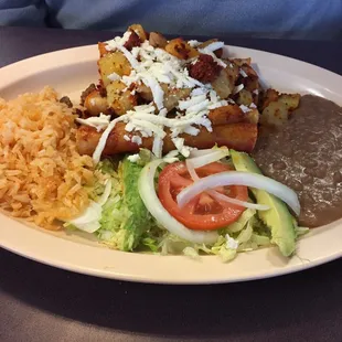 Enchiladas are made with little tortillas, but you get FOUR. And THE BEANS. YAS!