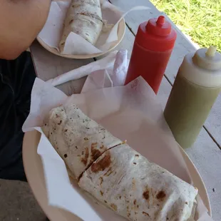 Burritos bigger than our face! And arms!