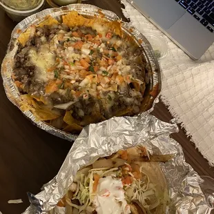 Steak Nachos and Fish taco. I&apos;m from socal and I approve.