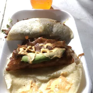 Quesitaco de asada with mandarin Jarritos