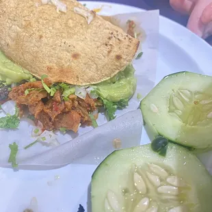 Mulita all view with the world! Onions and cucumbers on the side