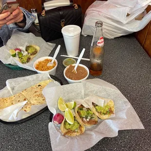 Quesadilla birria tacos an steak tacos.